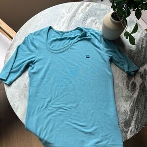 Teal double neckline Tshirt with a smiley face stitch